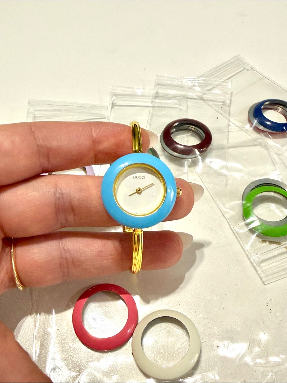 Gucci Vintage Gold Bangle Watch with Light Blue Interchangeable Bezel